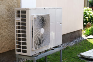 Heat pump outdoor unit outside of a home
